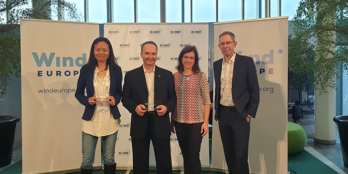 Xiaoli Guo Larsén and Gregor Giebel together with the two presenters